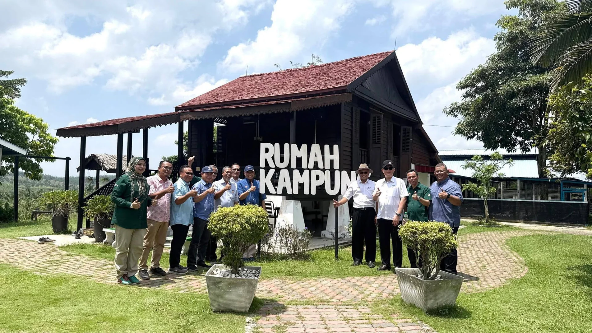 Visitors at the traditional Rumah Kampung in Selangor Fruit Valley